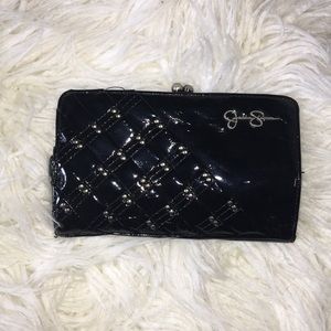 Jessica Simpson- black clutch